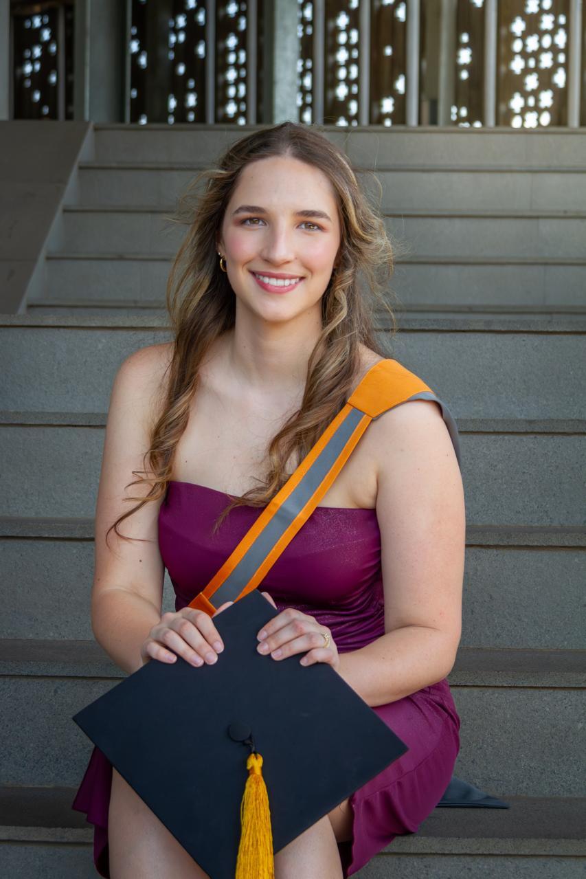 Tessa Prigge, Candidate Success Associate at DealTechno, working at her laptop